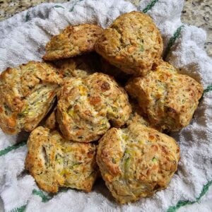 zucchini biscuits in linen-lined basket.